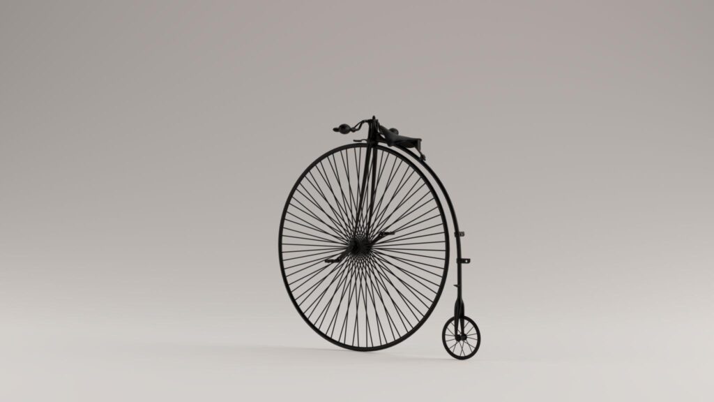 Penny-farthing bicycle with a large front wheel and small rear wheel, early bicycle design from the 19th century